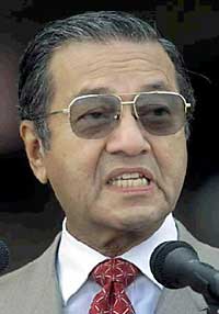 Former Malaysian Prime Minister Seeks to Try Bush, Blair for ‘War Crimes’