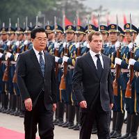 At Summit, Russia, China Talk Cooperation, Take Little Action