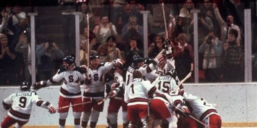 The U.S. men’s hockey team pounces on goalie Jim Craig after a 4-3 victory against the Soviet Union in a medal round match at the the 1980 Winter Olympics in Lake Placid, N.Y., Feb. 22, 1980 (AP file photo).