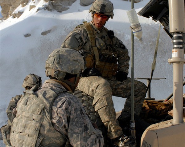 Photo: U.S. Army soldiers rest during a mission in the Hindu Kush mountain range in the Parwan province of Afghanistan, January 2009 (U.S. Army photo by Scott Davis).