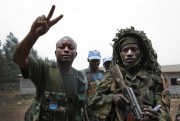 Congolese and U.N. forces celebrate after seizing a position from M23 fighters (U.N. photo by Sylvain Liechti).
