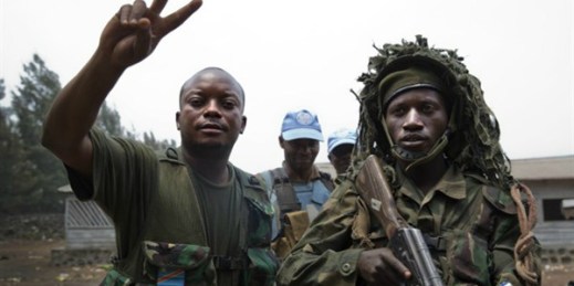 Congolese and U.N. forces celebrate after seizing a position from M23 fighters (U.N. photo by Sylvain Liechti).