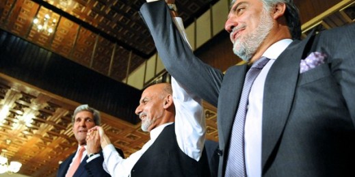 U.S. Secretary of State John Kerry raises hands with Afghan presidential candidates Ashraf Ghani, left, and Abdullah Abdullah, right, at the United Nations Mission Headquarters in Kabul, Afghanistan, July 12, 2014 (U.S. State Department photo).