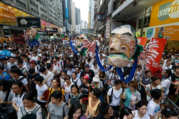 Protesters in Hong Kong, China, July 1, 2014 (AP photo by Kin Cheung).
