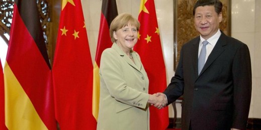 German Chancellor Angela Merkel shakes hands with Chinese President Xi Jinping at the Diaoyutai State Guesthouse in Beijing, China, July 7, 2014 (Kyodo via AP Images).