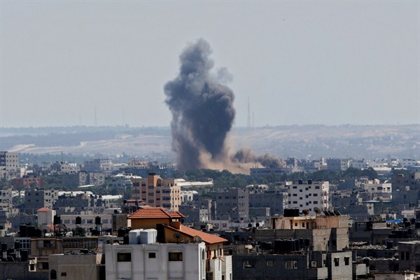 Smoke rises after an Israeli missile strike in Gaza City, July 15, 2014 (AP photo by Adel Hana).