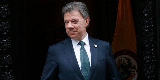 Colombian President Juan Manuel Santos awaits the arrival of U.S. Secretary of State John Kerry for a bilateral meeting, Oct. 1, 2015, New York (AP photo by Jason DeCrow).