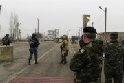 Military visitors from OSCE participating states wait at a checkpoint between Ukraine and Crimea, Armyansk, Ukraine, March 6, 2014 (OSCE photo licensed under the Creative Commons Attribution - No Derivative Works license).