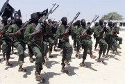 Hundreds of newly trained Shabab fighters perform military exercises in the Lafofe area some 18Km south of Mogadishu on Thursday Feb. 17, 2011 (AP Photo/Farah Abdi Warsameh).