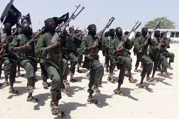 Hundreds of newly trained Shabab fighters perform military exercises in the Lafofe area some 18Km south of Mogadishu on Thursday Feb. 17, 2011 (AP Photo/Farah Abdi Warsameh).