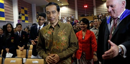 Indonesian President Joko Widodo, popularly known as “Jokowi,” attends a graduation ceremony of the International Baccalaureate Diploma Programme at the Anglo Chinese School (International) in Singapore, Nov. 21, 2014 (AP photo by Wong Maye-E).