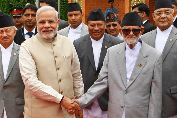 Indian Prime Minister Narendra Modi poses with his Nepalese counterpart Sushil Koirala in Katmandu, Nepal, Aug. 3, 2014 (AP photo by Niranjan Shrestha).