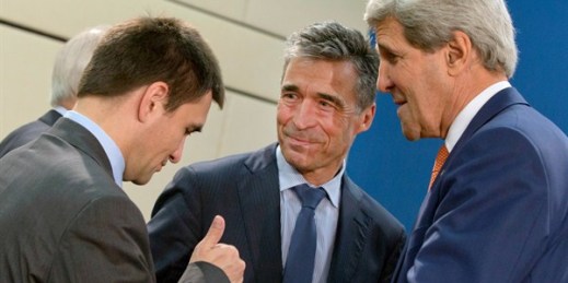 Ukrainian Foreign Minister Pavlo Klimkin speaks with NATO Secretary General Anders Fogh Rasmussen and U.S. Secretary of State John Kerry during a meeting of the NATO-Ukraine Commission in Brussels, June 25, 2014 (AP photo by Virginia Mayo).