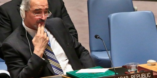Syria U.N. ambassador Bashar Ja'afari listens after a U.N. Security Council vote on referring the Syrian crisis to the International Criminal Court for investigation of possible war crimes, May 22, 2014 (AP photo by Bebeto Matthews).