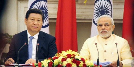 Chinese President Xi Jinping and Indian Prime Minister Narendra Modi hold a joint news conference in New Delhi on Sept. 18, 2014, after their talks (Kyodo via AP Images).