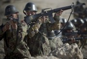 Afghan army soldiers get shooting instructions at a training facility in the outskirts of Kabul, Afghanistan, Nov. 26, 2013 (AP photo by Anja Niedringhaus).