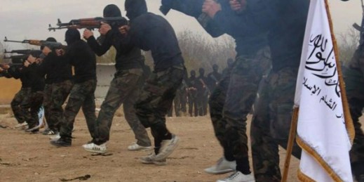 In this undated file picture released Nov. 29, 2013, posted on the Facebook page of a militant group, members of Ahrar al-Sham brigade exercise in a training camp at unknown place in Syria (AP photo).