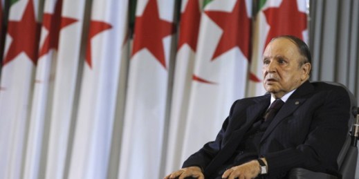 Algerian President Abdelaziz Bouteflika sits on a wheelchair after taking oath as President, April 28, 2014, in Algiers (AP photo by Sidali Djarboub).