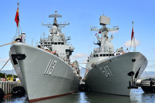 The Chinese People’s Liberation Army-Navy Jiangkai-class frigate Linyi moors alongside the Luhu-class destroyer Qingdao, Joint Base Pearl Harbor-Hickam, Sept. 6, 2013 (U.S. Navy photo by Daniel Barker).