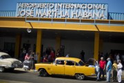 People put their luggage in a private taxi as they arrive from the U.S. to the Jose Marti International Airport in Havana, Cuba, Sept. 1, 2014 (AP photo by Ramon Espinosa).