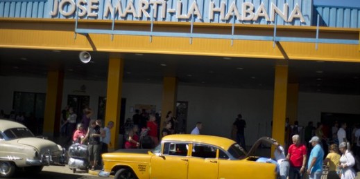 People put their luggage in a private taxi as they arrive from the U.S. to the Jose Marti International Airport in Havana, Cuba, Sept. 1, 2014 (AP photo by Ramon Espinosa).