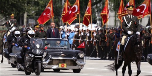 Turkish President Recep Tayyip Erdogan, center right, and Chief of Staff Gen. Necdet Ozel, rear left, on Victory Day in Ankara, Turkey, Aug. 30, 2014 (AP photo by Burhan Ozbilici).