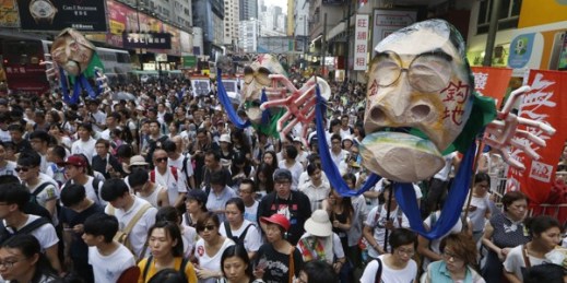 Photo: Protesters in Hong Kong, China, July 1, 2014 (AP photo by Kin Cheung).