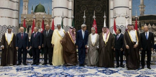 U.S. Secretary of State John Kerry poses with his Arab counterparts after a meeting with them in Jiddah, Saudi Arabia, Sept. 11, 2014 (AP Photo/Brendan Smialowski, Pool).