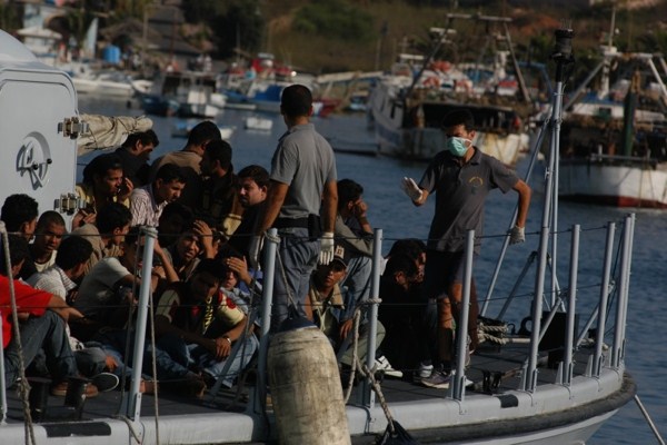 Migrants arriving on the island of Lampedusa, Italy, Aug. 2007 (photo by Flickr user No Border Network licensed under the Creative Commons Attribution 2.0 Generic license).