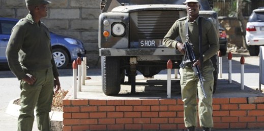 Army personnel outside the military headquarters in Maseru, Lesotho, Aug. 31, 2014 photo (AP photo).