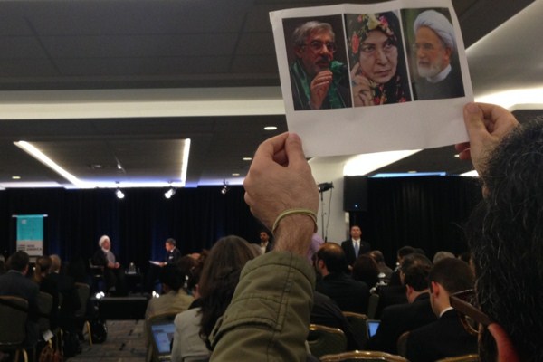 Protester at the talk with Iranian President Hassan Rouhani, New York, Sept. 24, 2014 (photo by David Klion).