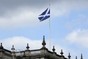 The Saltire flies on a government building at Whitehall in central London, Sept. 10, 2014 (AP photo by Lefteris Pitarakis).