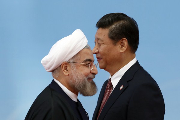 Iran's President Hassan Rouhani, left, and Chinese President Xi Jinping before the opening ceremony at the fourth Conference on Interaction and Confidence Building Measures in Asia (CICA) summit in Shanghai, China, May 21, 2014 (AP photo by Aly Song).