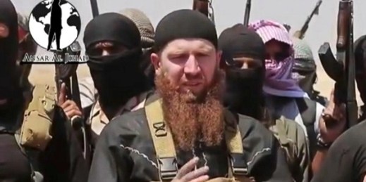 This image made from an undated video shows Tarkhan Batirashvili, known as Omar al-Shishani, among a group of Islamic State fighters (AP Photo/militant social media account via AP video).