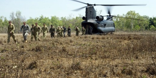 U.S., Australian and Chinese service members disembark from an Australian Army CH-47 Chinook helicopter at a remote landing zone in Northern Territory, Australia, Oct. 12, 2014 (DoD photo by Cpl. Jake Sims, Australian Defense Force).
