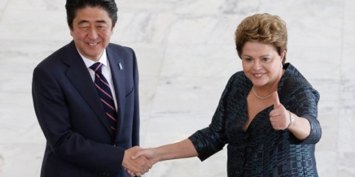 Japanese Prime Minister Shinzo Abe shakes hands with Brazilian President Dilma Rousseff at the Planalto Presidential Palace, Brasilia, Brazil, Aug. 1, 2014 (AP photo by Eraldo Peres).