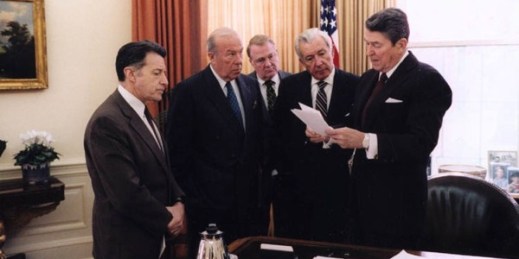 President Ronald Reagan with Caspar Weinberger, George Shultz, Ed Meese and Don Regan, Nov. 25, 1986 (White House photo from the Ronald Reagan Library).