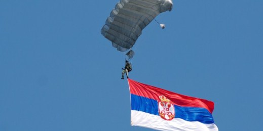 Paratrooper carrrying the Serbian flag, Batanjnica, Serbia, Aug. 2, 2008 (photo by Flickr user jetsetwilly licensed under the Creative Commons Attribution-NonCommercial-ShareAlike 2.0 Generic license).