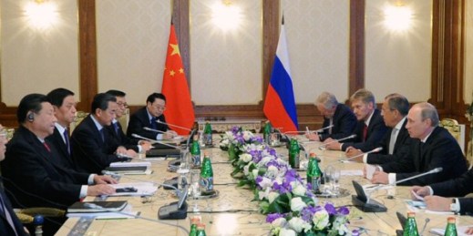 Russian President Vladimir Putin and Chinese President Xi Jinping talk during their meeting in Dushanbe, Tajikistan, Sept. 11, 2014 (AP Photo/RIA Novosti, Mikhail Klementyev, Presidential Press Service).