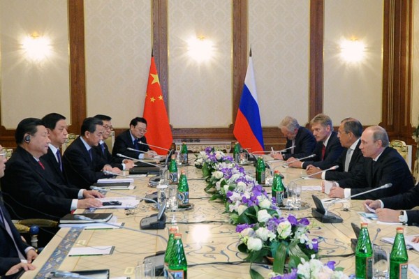 Russian President Vladimir Putin and Chinese President Xi Jinping talk during their meeting in Dushanbe, Tajikistan, Sept. 11, 2014 (AP Photo/RIA Novosti, Mikhail Klementyev, Presidential Press Service).