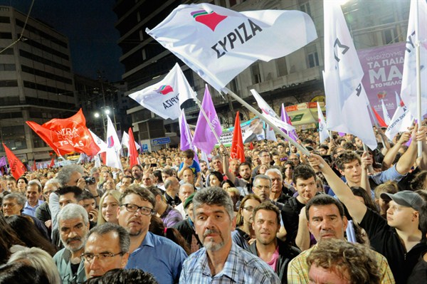 Supporters of Greece’s radical leftist party Syriza rally in Athens as European Union voters cast ballots in European Parliament elections, May 22, 2014 (Kyodo via AP Images).