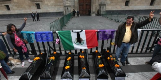 Demonstrators protest the disappearance of 43 students in Ayotzinapa, Mexico City, Nov. 16, 2014 (AP photo by Marco Ugarte).