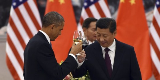 U.S. President Barack Obama and Chinese President Xi Jinping toast at a lunch banquet in the Great Hall of the People in Beijing, Nov. 12, 2014 (AP photo by Greg Baker).