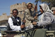 Houthi Shiite rebels ride in a military truck while patrolling a street in Sanaa, Yemen, Oct. 27, 2014 (AP photo by Hani Mohammed).