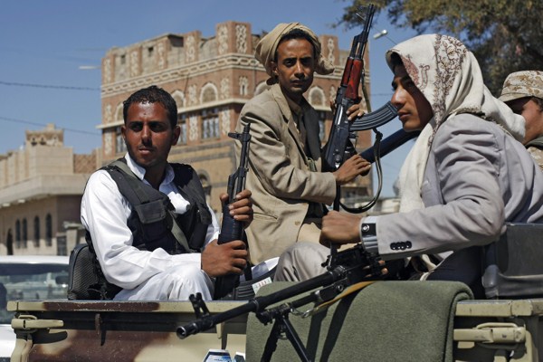 Houthi Shiite rebels ride in a military truck while patrolling a street in Sanaa, Yemen, Oct. 27, 2014 (AP photo by Hani Mohammed).