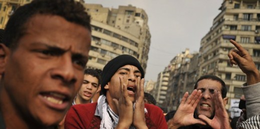 Egyptian youths shout slogans against the country’s ruling military council during a demonstration in Tahrir Square in Cairo, Egypt, Nov. 30, 2011 (AP photo by Bela Szandelszky).