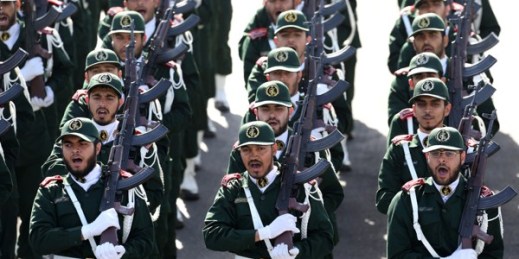Members of Iran’s Revolutionary Guard march during an annual military parade just outside Tehran, Iran, Sept. 22, 2014 (AP photo by Ebrahim Noroozi).
