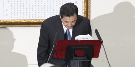 Taiwanese President Ma Ying-jeou bows as he tenders his resignation as chairman of the ruling Kuomintang (KMT) party, Taipei, Taiwan, Dec. 3, 2014 (AP photo by Wally Santana).
