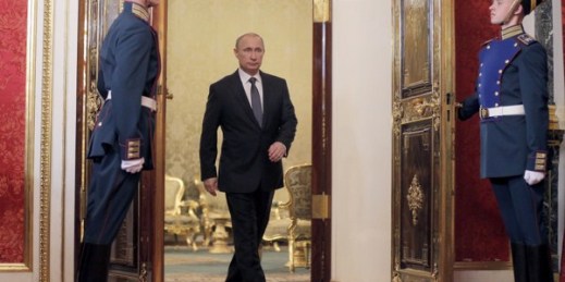 Russian President Vladimir Putin enters a hall for a meeting of the Collective Security Treaty Organization (CSTO) in the Kremlin, Moscow, Dec. 23, 2014 (AP photo by Maxim Shipenkov).