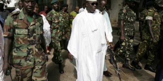 Gambian President Yahya Jammeh leaves a central Banjul polling station after casting his vote for president in Banjul, Gambia, Sept. 22, 2006 (AP photo by Rebecca Blackwell).